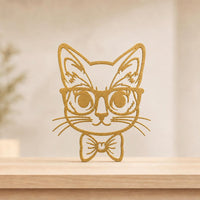 gato-anteojos-dorado-mesa.jpg
